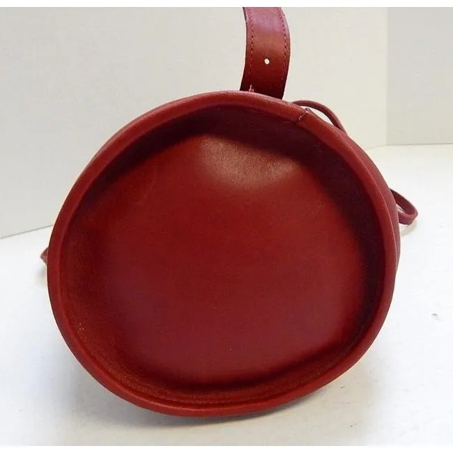 vintage, Coach, 'Bixby', large, drawstring top, bucket shaped, satchel style, sling style shoulder bag or backpack in buttery soft red leather with brass accents