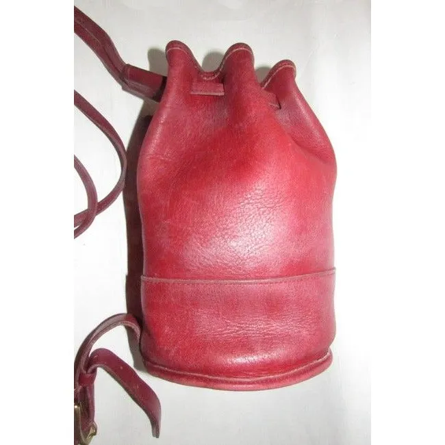 vintage, Coach, 'Bixby', large, drawstring top, bucket shaped, satchel style, sling style shoulder bag or backpack in buttery soft red leather with brass accents