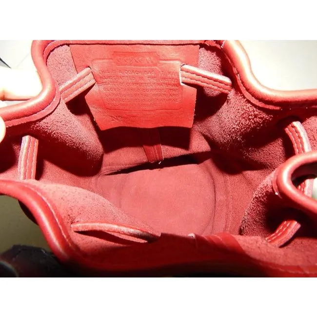 vintage, Coach, 'Bixby', large, drawstring top, bucket shaped, satchel style, sling style shoulder bag or backpack in buttery soft red leather with brass accents