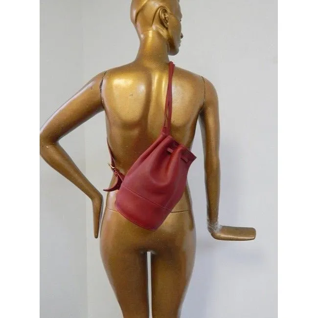 vintage, Coach, 'Bixby', large, drawstring top, bucket shaped, satchel style, sling style shoulder bag or backpack in buttery soft red leather with brass accents